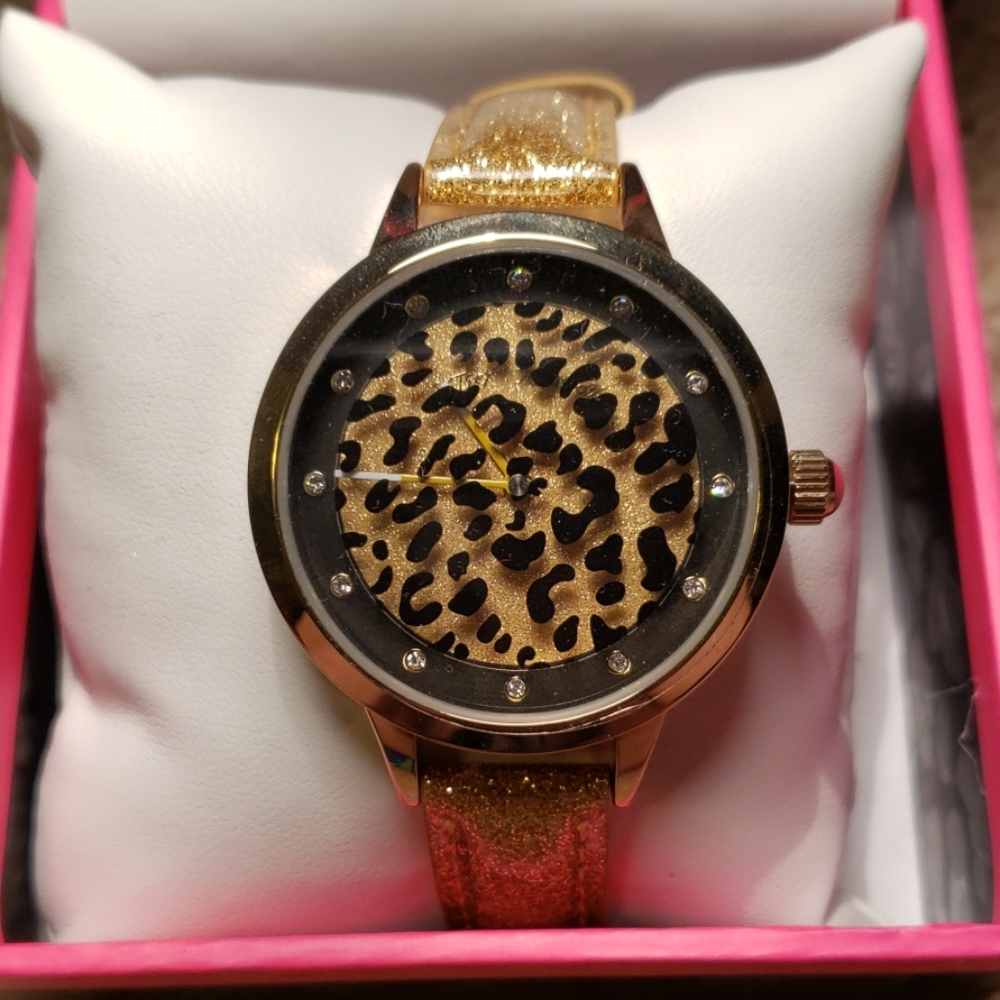 Betsey Johnson round & round leopard gold watch
